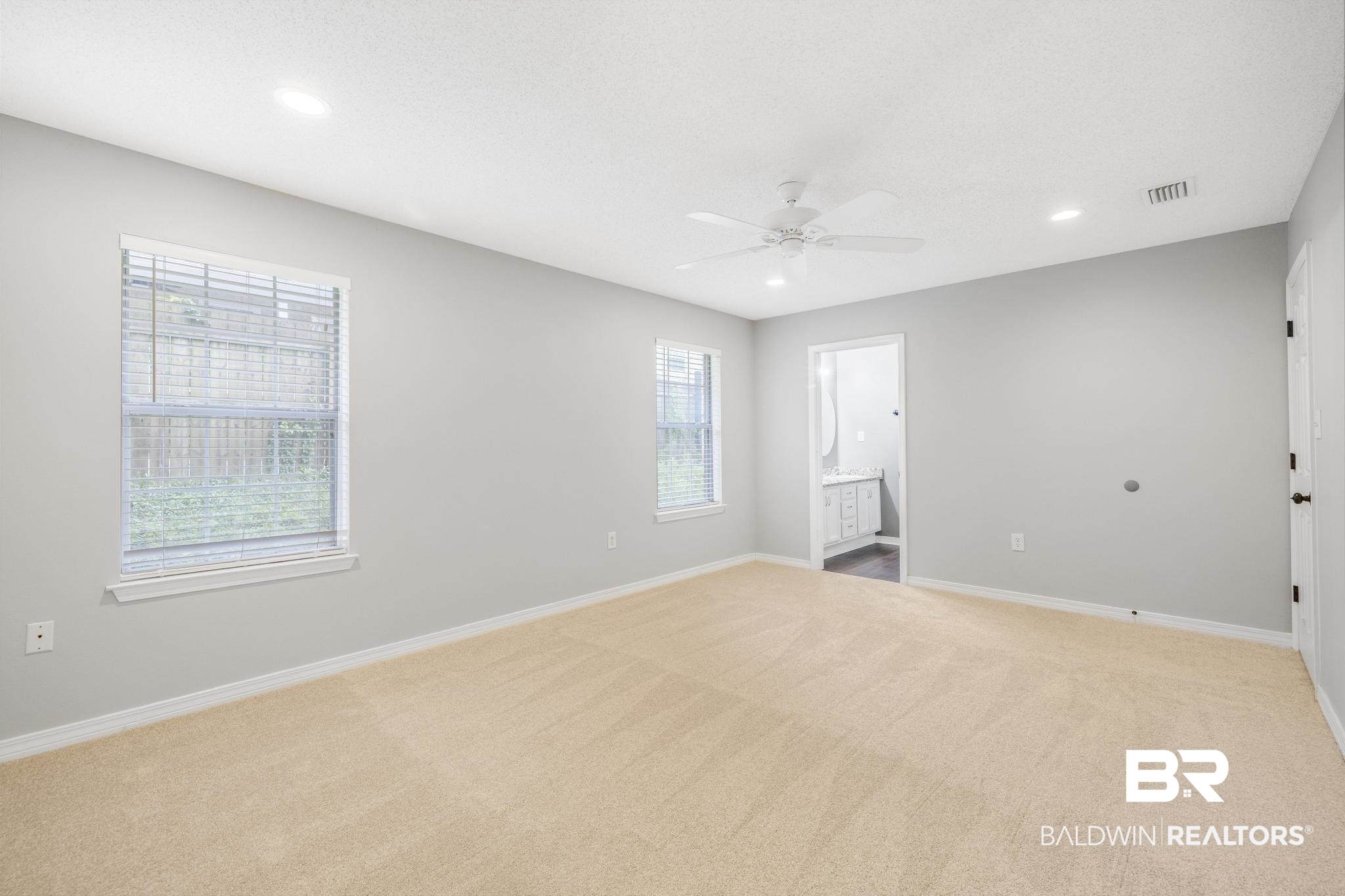 140 Hope Drive Daphne, AL 36526 - Photo 23 of 54 Unfurnished bedroom featuring light carpet, recessed lighting, ensuite bathroom, and ceiling fan