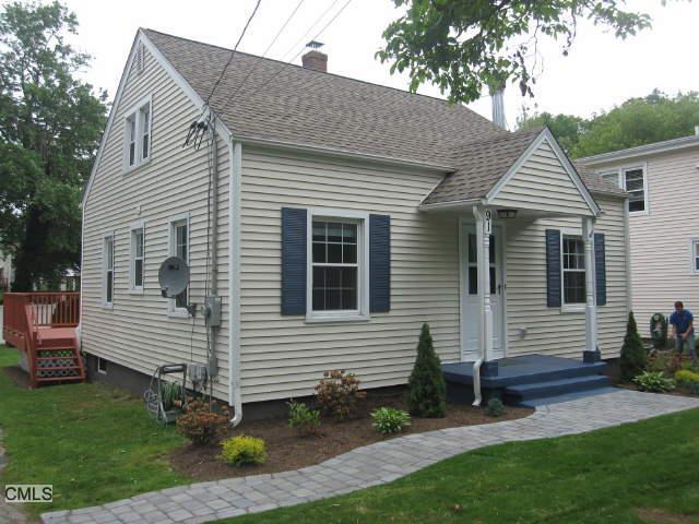 91 Twitchgrass Road Trumbull, CT 06611 - Photo 1 of 1 a view of a white house with a yard