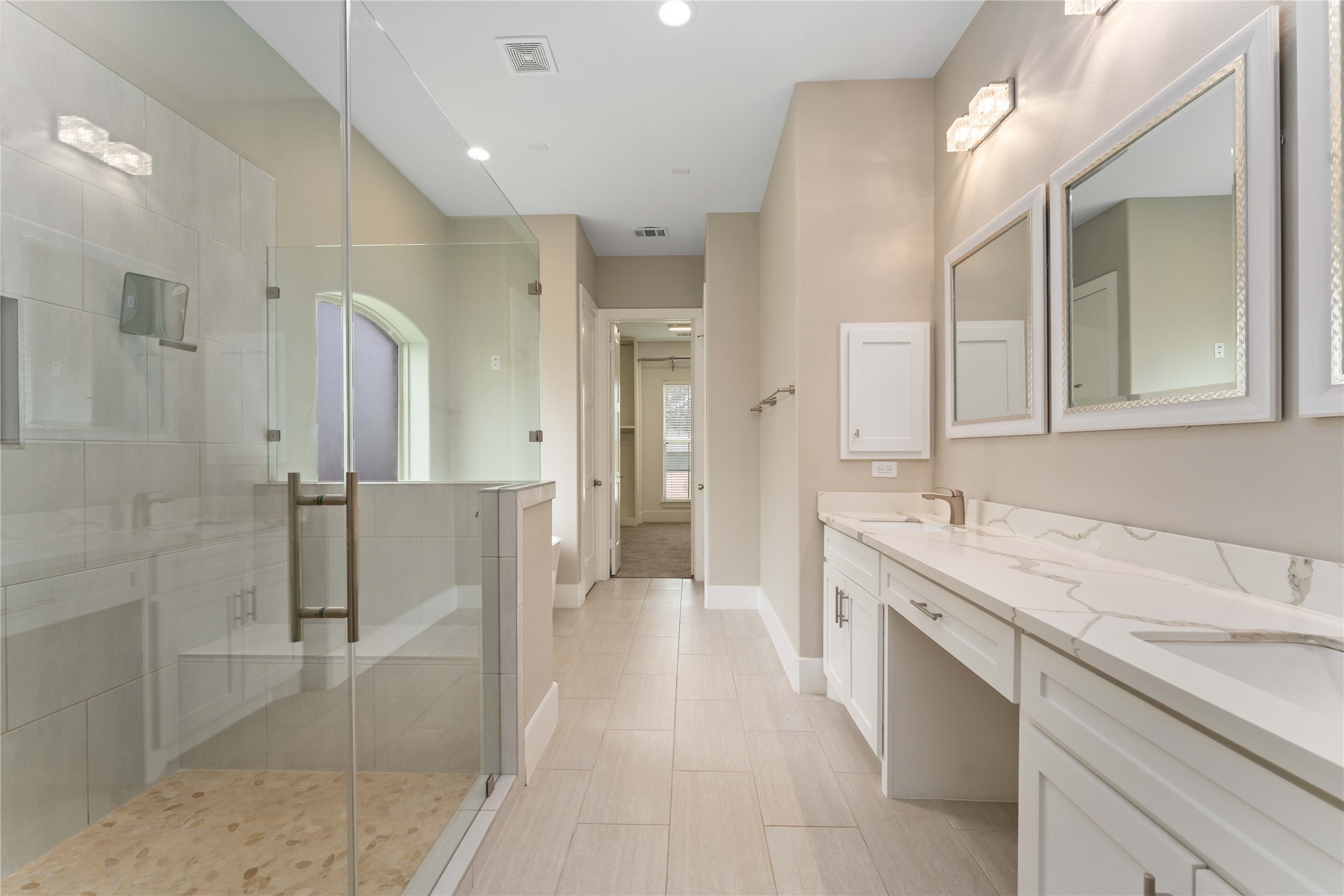 4310 Fernwood Drive Houston, TX 77021 - Photo 14 of 27 a spacious bathroom with a granite countertop sink mirror and shower
