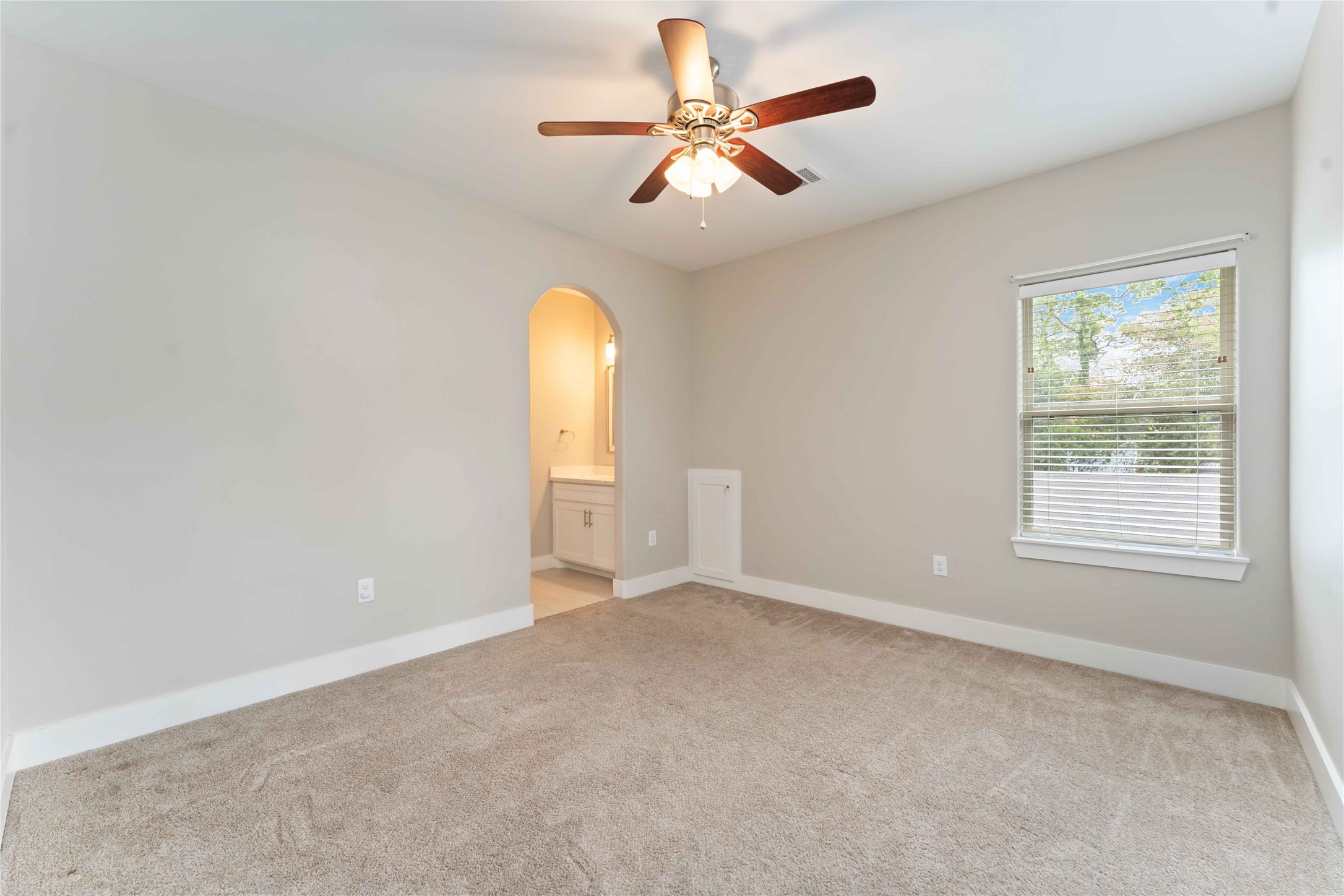 4310 Fernwood Drive Houston, TX 77021 - Photo 20 of 27 an empty room with a window and a fan