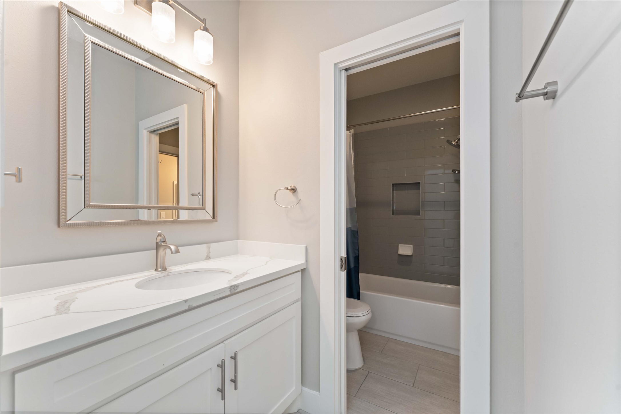 4310 Fernwood Drive Houston, TX 77021 - Photo 21 of 27 a bathroom with a sink a toilet and shower