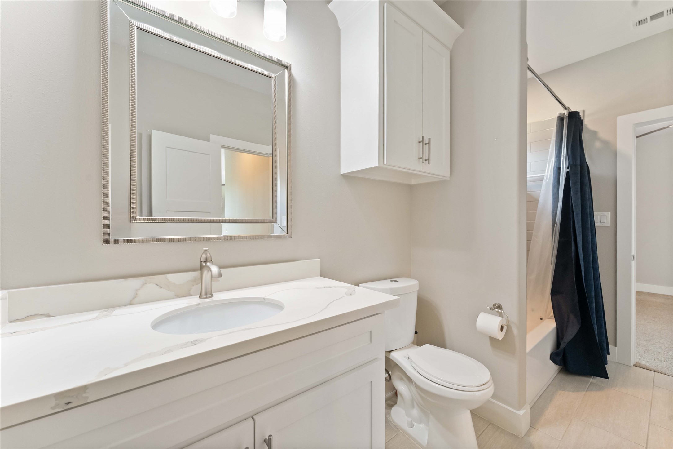 4310 Fernwood Drive Houston, TX 77021 - Photo 26 of 27 a bathroom with a sink toilet and vanity