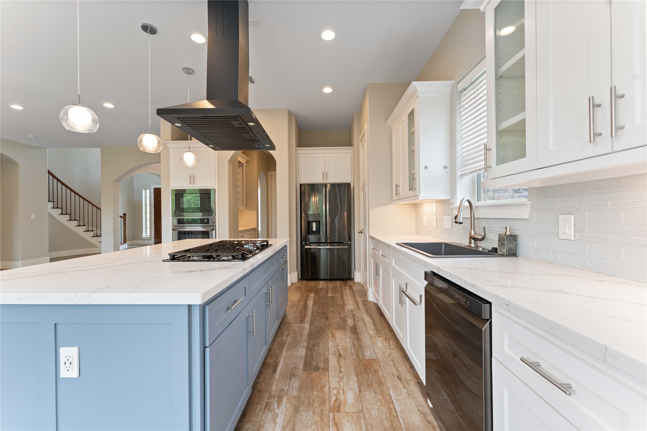 4310 Fernwood Drive Houston, TX 77021 - Photo 5 of 27 a large kitchen with a large counter top a sink stainless steel appliances and cabinets