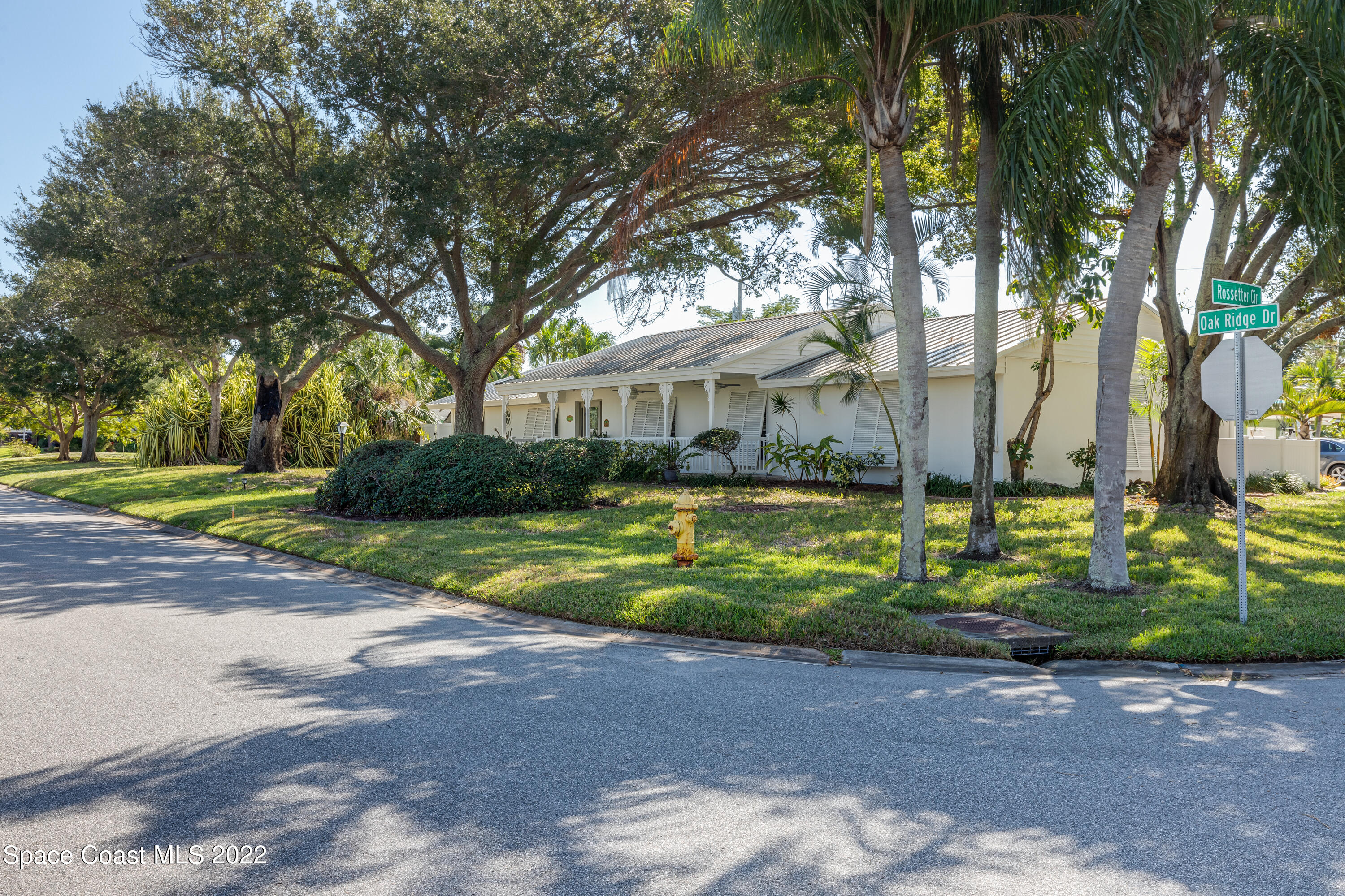 515 Oak Ridge Drive Indialantic, FL 32903 - Photo 2 of 34 a view of backyard of house with green space
