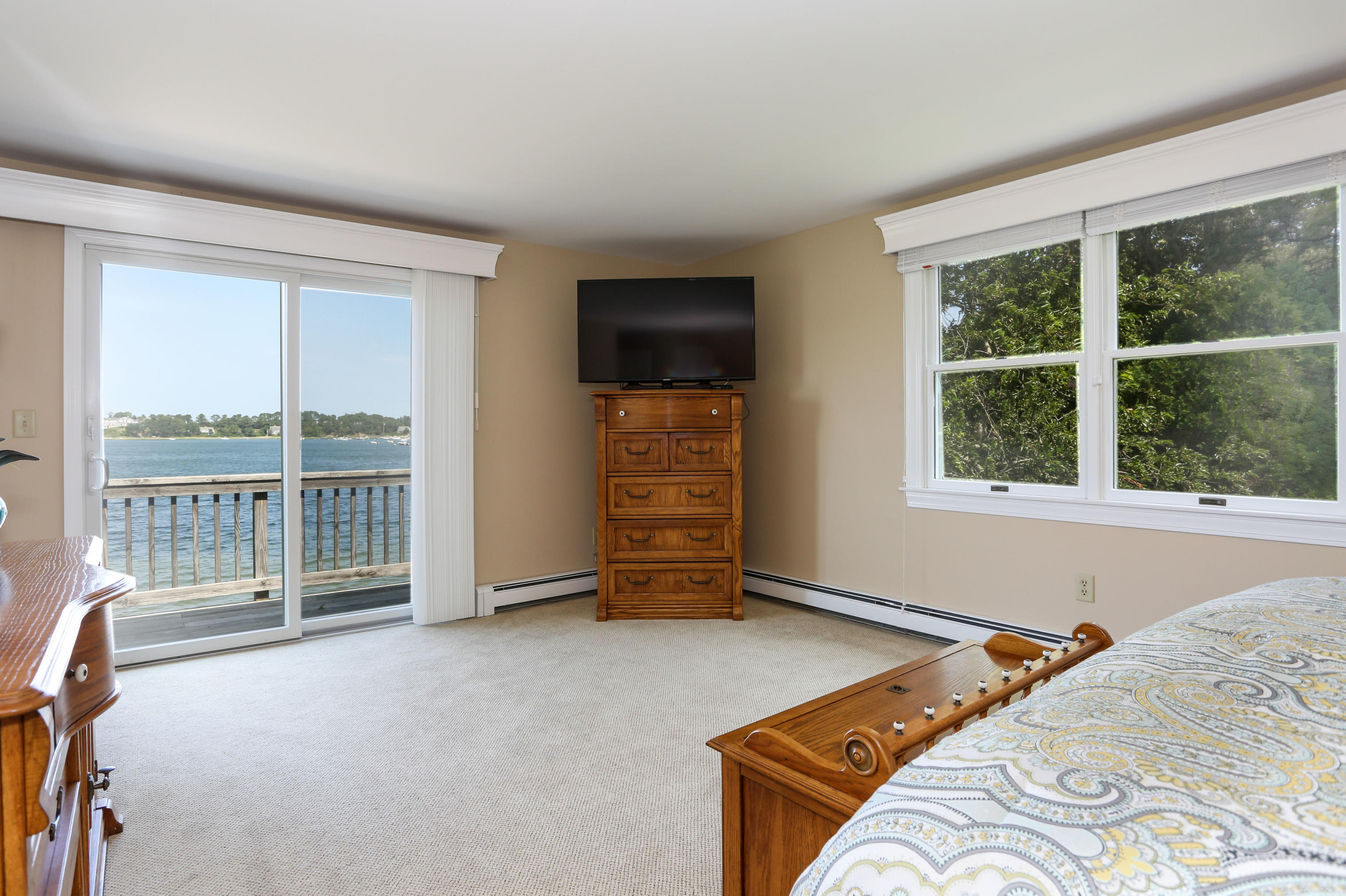 159 Seapine Road North Chatham, MA 02650 - Photo 14 of 31 a bedroom with a bed and a large window