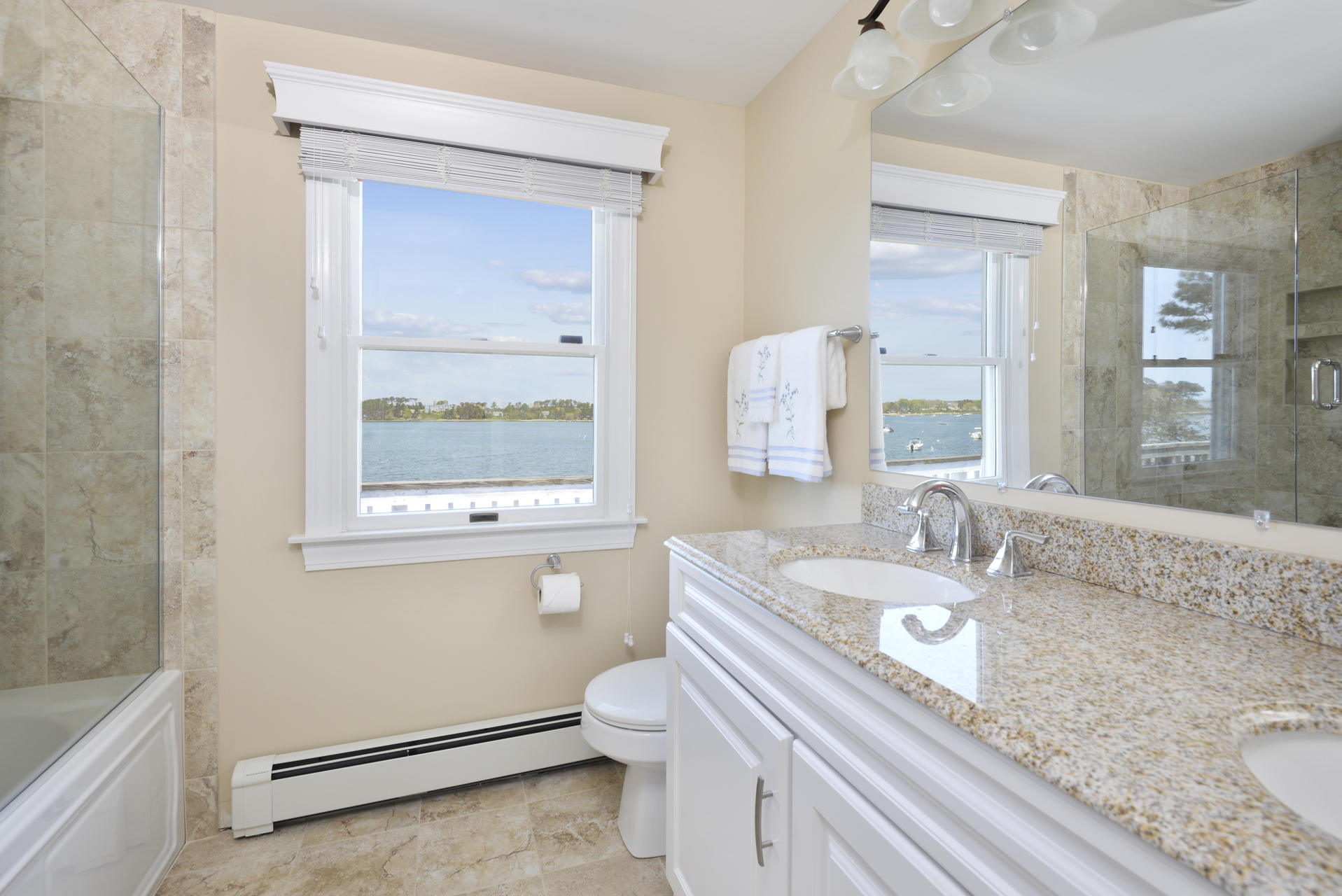 159 Seapine Road North Chatham, MA 02650 - Photo 18 of 31 a bathroom with a granite countertop sink mirror vanity and bathtub