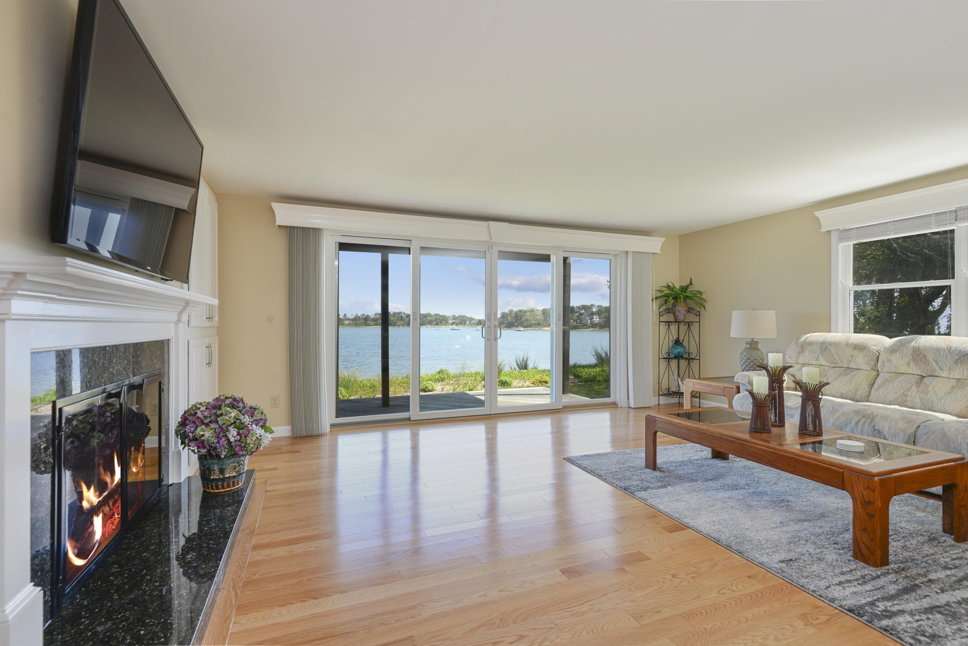 159 Seapine Road North Chatham, MA 02650 - Photo 8 of 31 a living room with furniture large windows and wooden floor