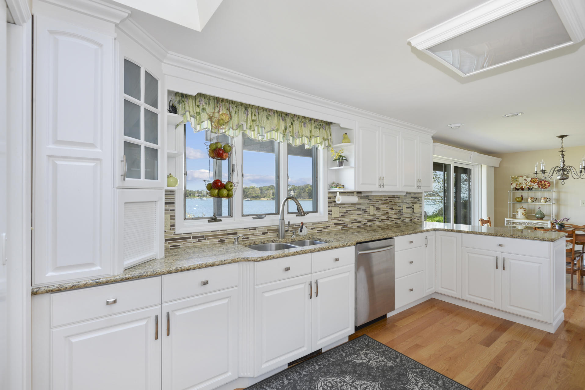 159 Seapine Road North Chatham, MA 02650 - Photo 9 of 31 a kitchen with a sink and cabinets