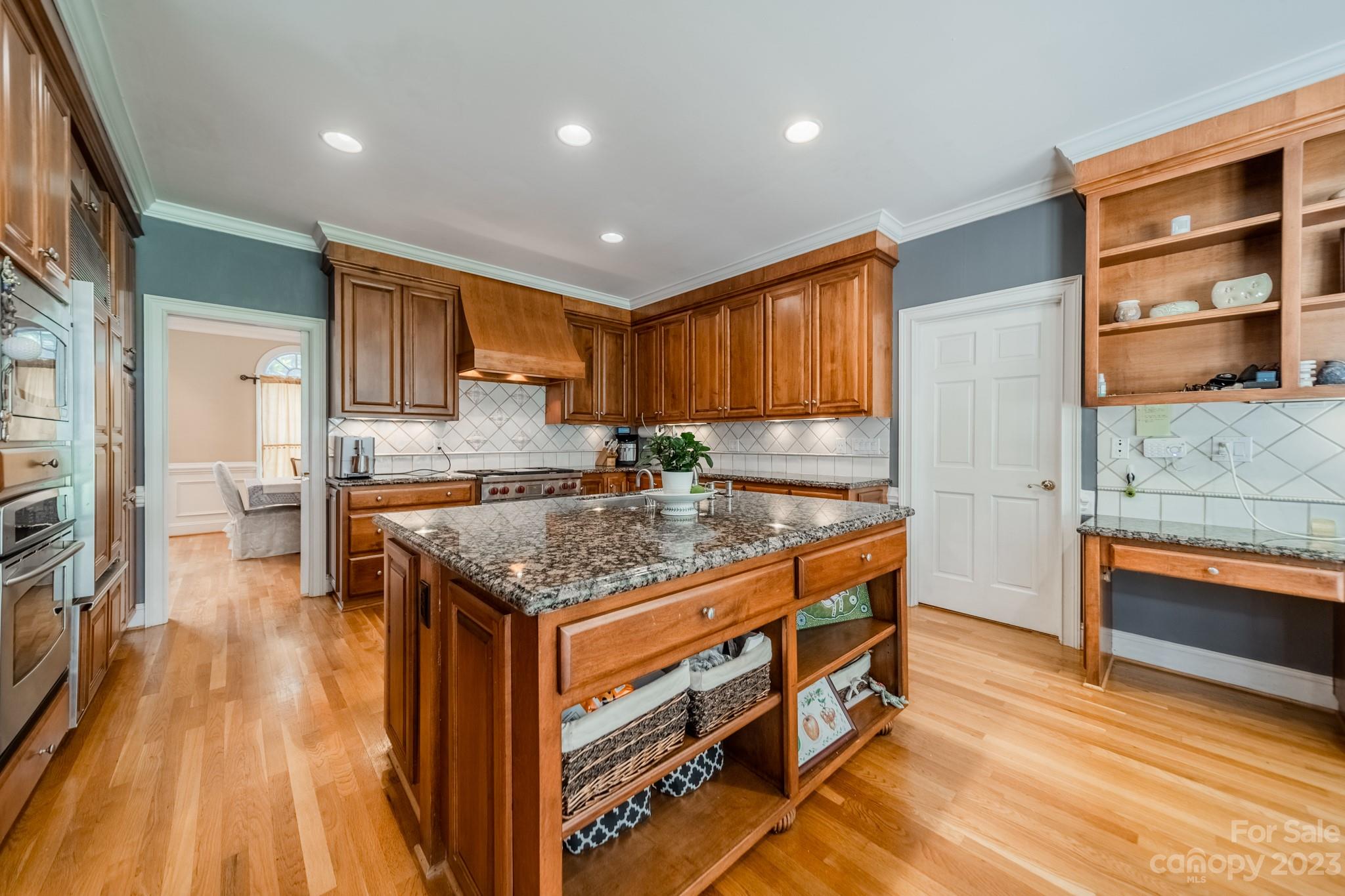 1439 Windy Ridge Road Charlotte, NC 28270 - Photo 15 of 46 a kitchen with stainless steel appliances granite countertop a stove and a sink
