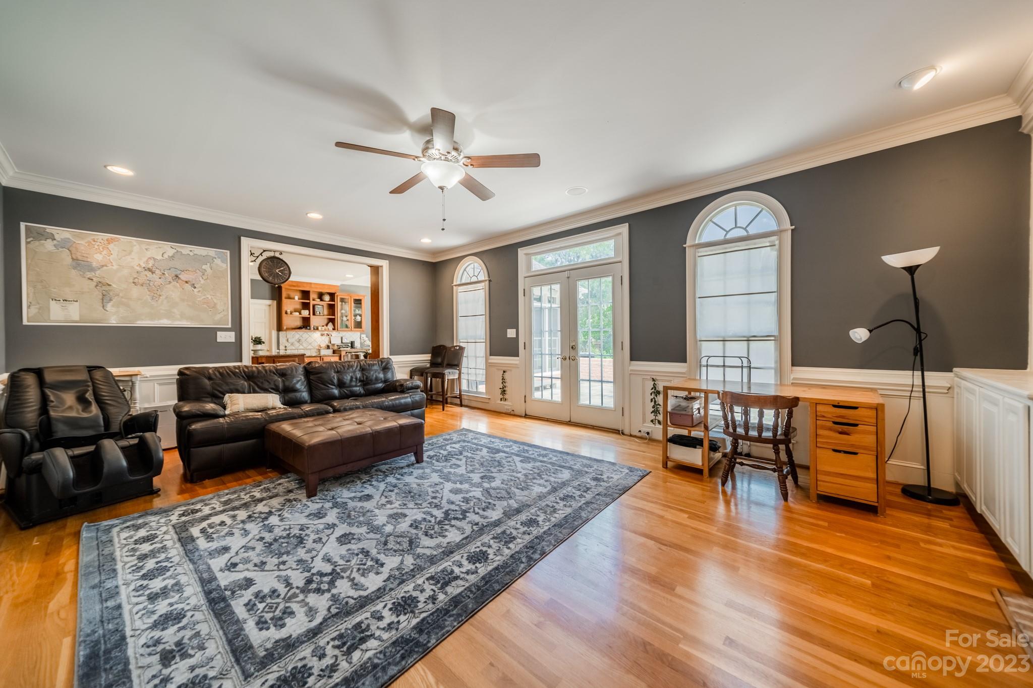 1439 Windy Ridge Road Charlotte, NC 28270 - Photo 22 of 46 a living room with furniture rug and window