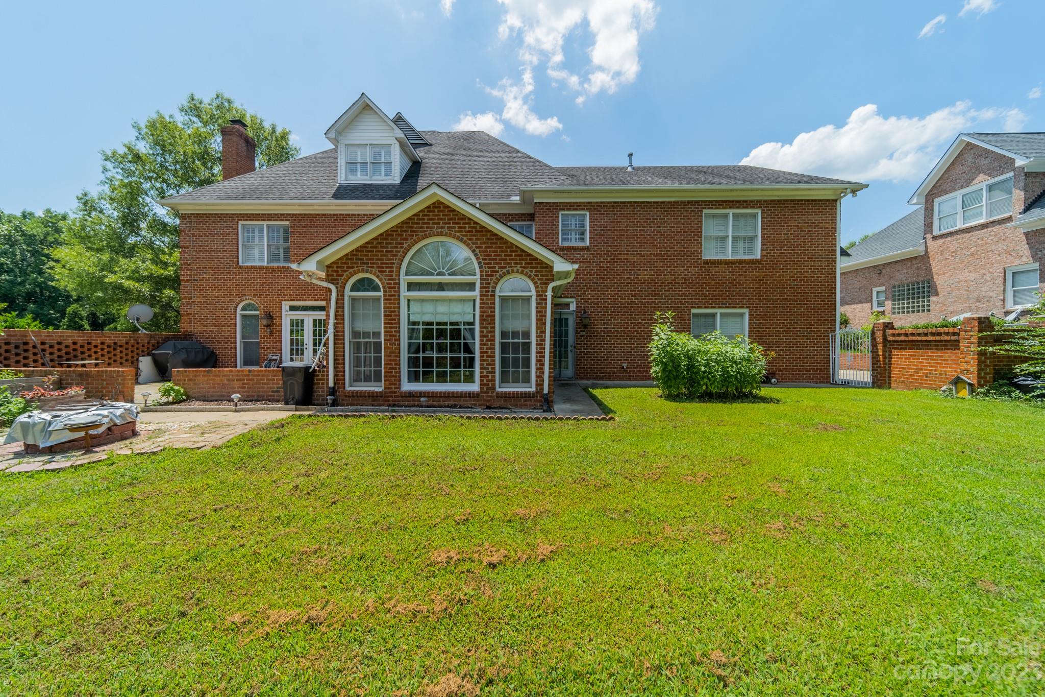 1439 Windy Ridge Road Charlotte, NC 28270 - Photo 41 of 46 a view of a house with a yard porch and sitting area