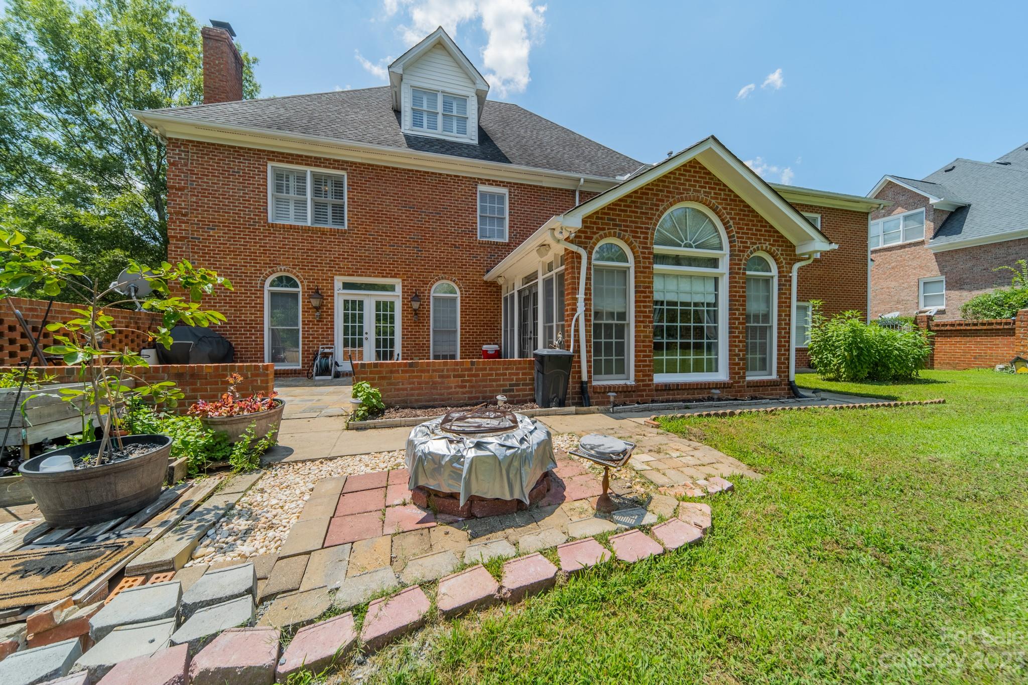 1439 Windy Ridge Road Charlotte, NC 28270 - Photo 42 of 46 a front view of a house with garden