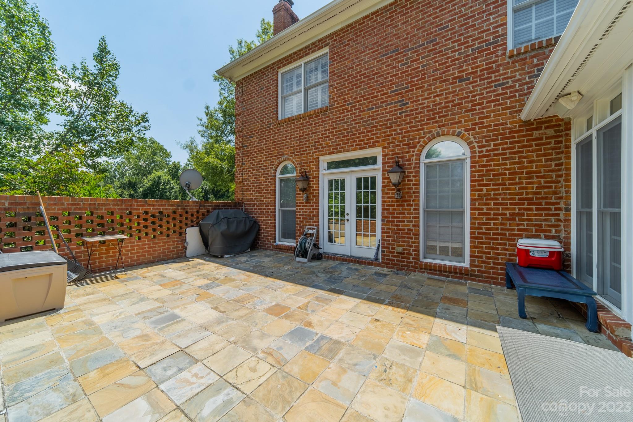 1439 Windy Ridge Road Charlotte, NC 28270 - Photo 43 of 46 a view of backyard with outdoor seating