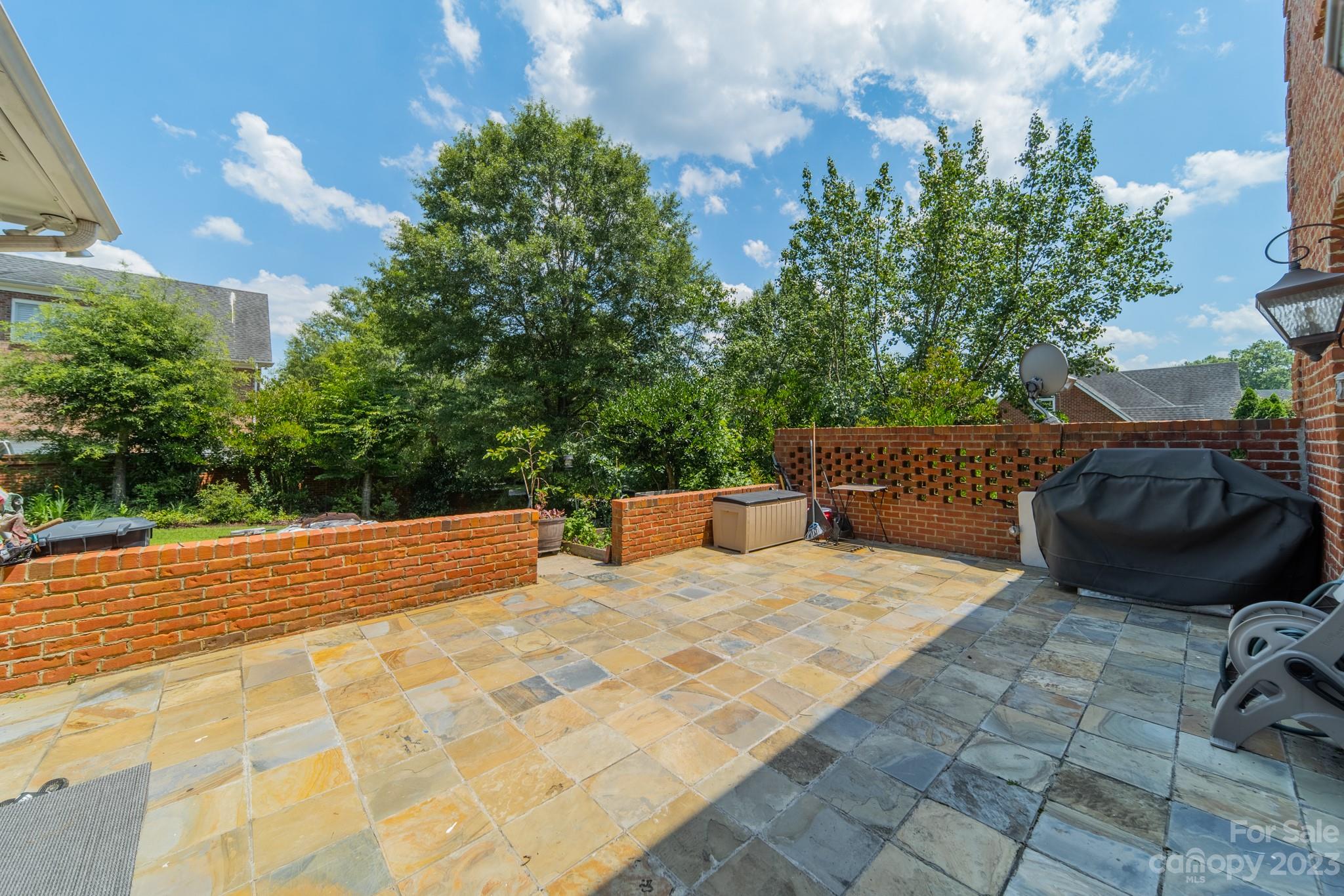 1439 Windy Ridge Road Charlotte, NC 28270 - Photo 44 of 46 a view of a backyard with sitting area