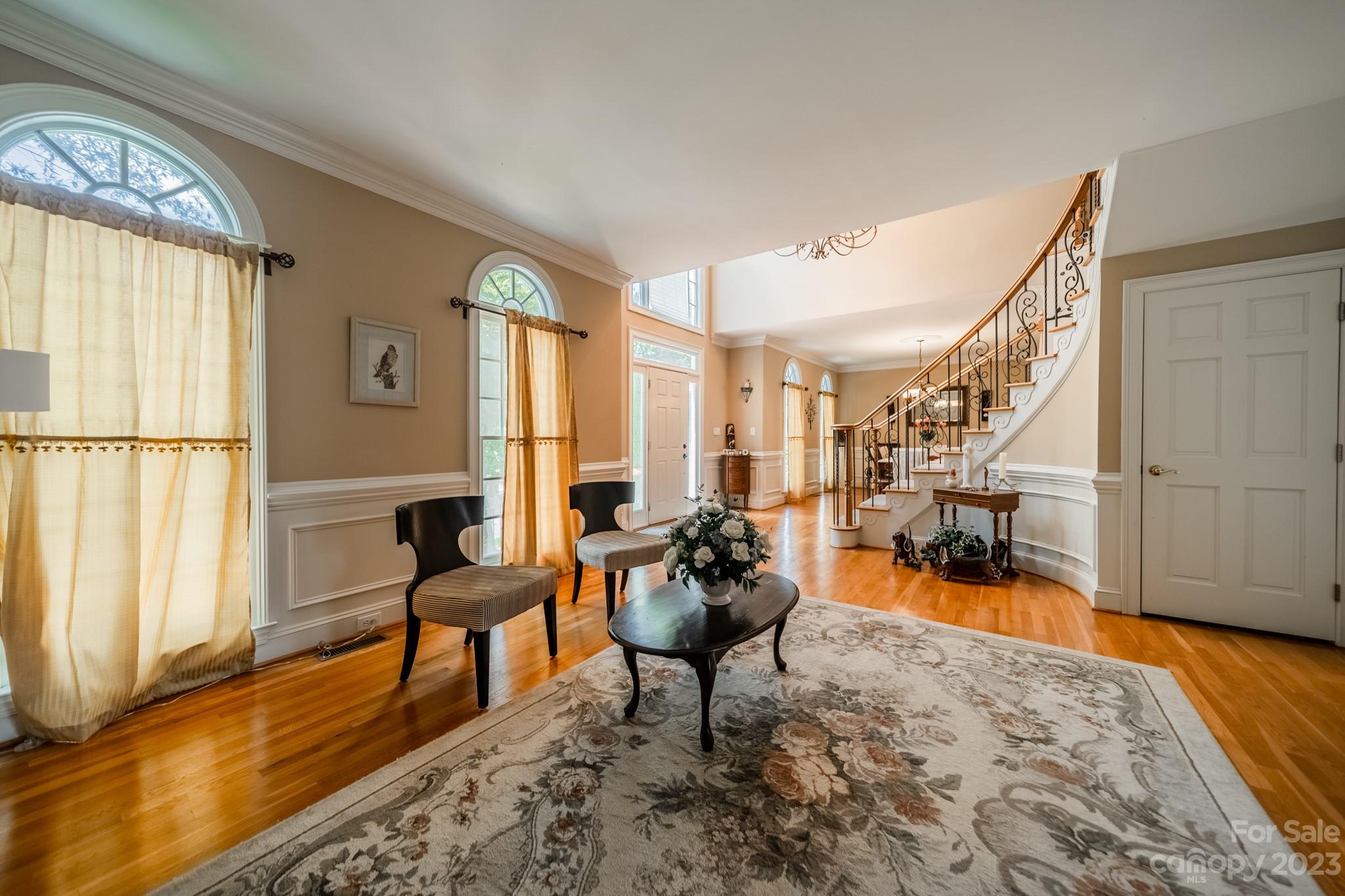 1439 Windy Ridge Road Charlotte, NC 28270 - Photo 7 of 46 a living room with furniture and a large window