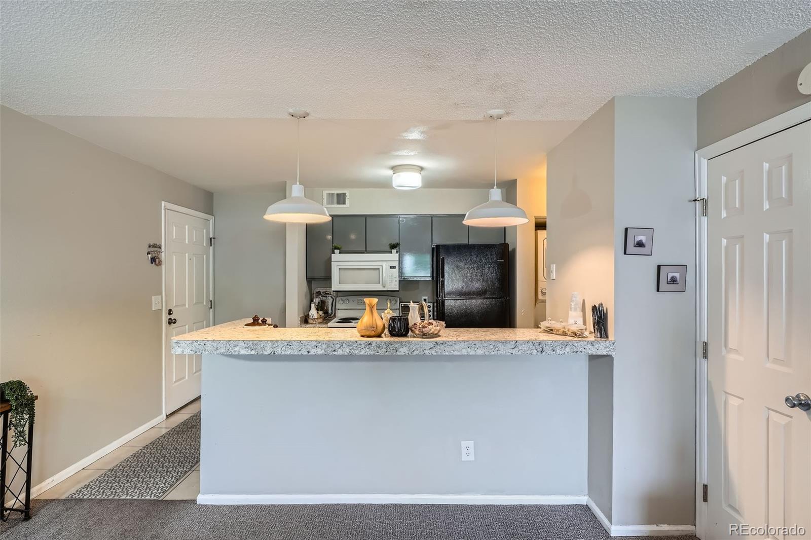 2575 South Syracuse Way, Unit B107 Denver, CO 80231 - Photo 7 of 28