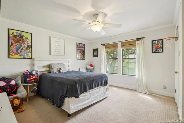 a view of a porch with furniture and a yard