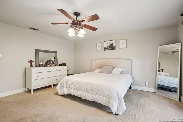 a open kitchen with stainless steel appliances granite countertop a sink a stove and a wooden floors