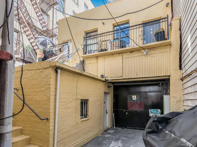 a view of a house with a street