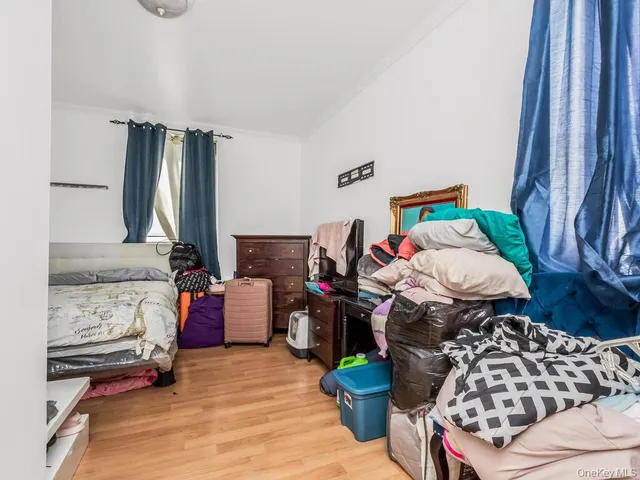 a bed room with a bed and a couch