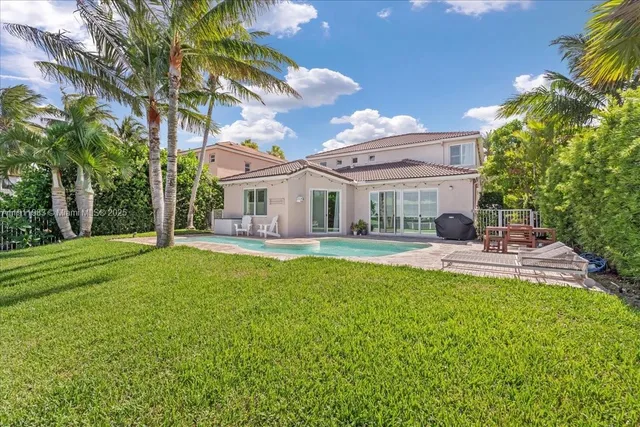 a bathroom with a toilet a sink and a mirror