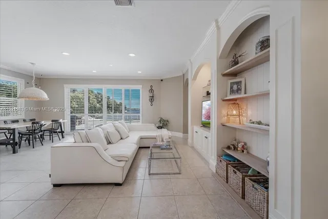 a kitchen with refrigerator cabinets and furniture