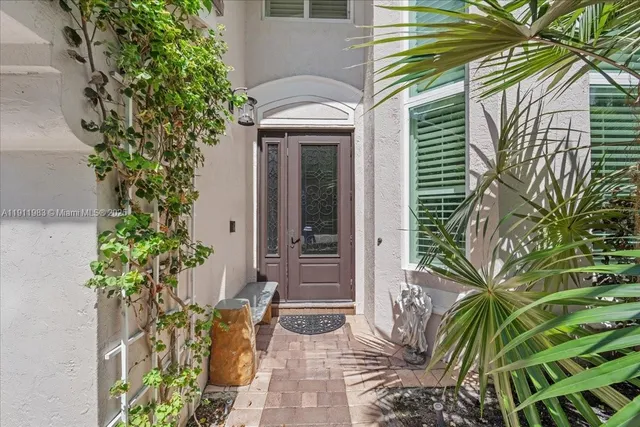 a view of a swimming pool with a yard