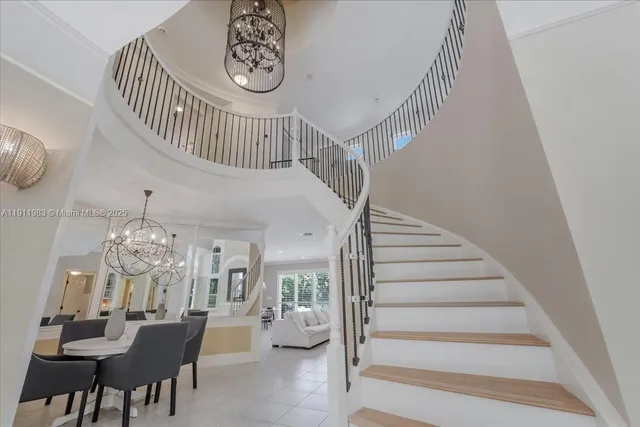a view of livingroom and dining room with wooden floor