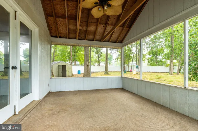 a large white room with a large window