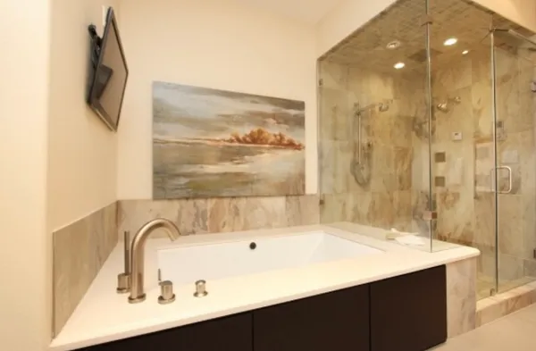 a room with view of kitchen and bathroom