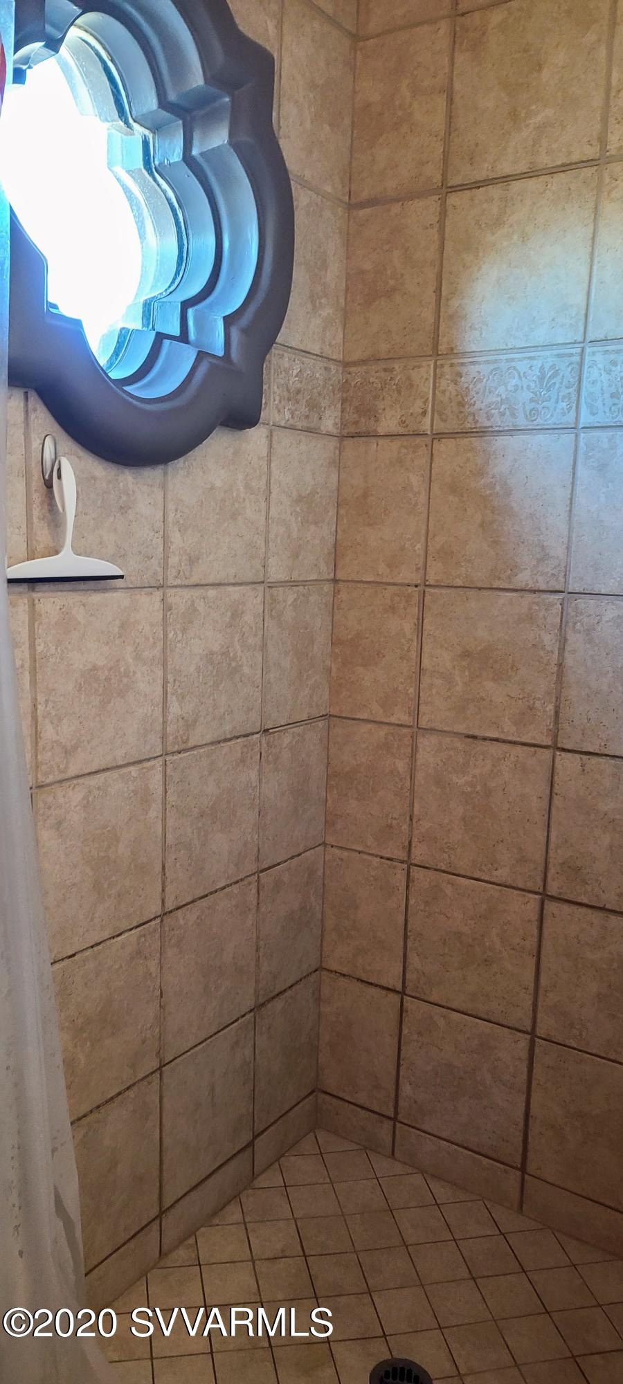 520 Jordan Road, Unit 7 Sedona, AZ 86336 - Photo 20 of 42 Master shower with decorative view windo