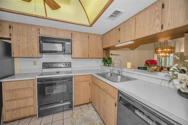 a huge green field with lots of trees