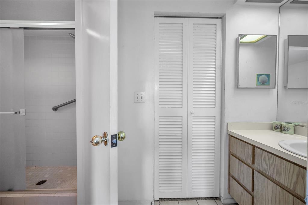 11511 113th Street, Unit 35E Largo, FL 33778 - Photo 28 of 77 a bathroom with a shower