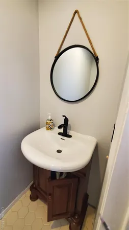 a bathroom with a sink and a toilet