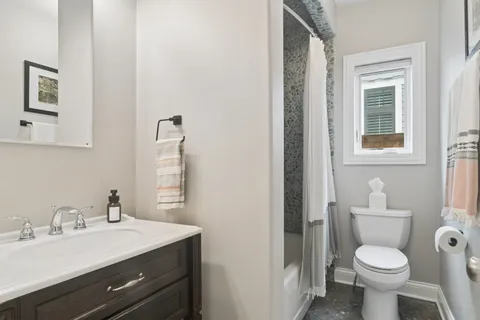 a bathroom with a sink and a toilet