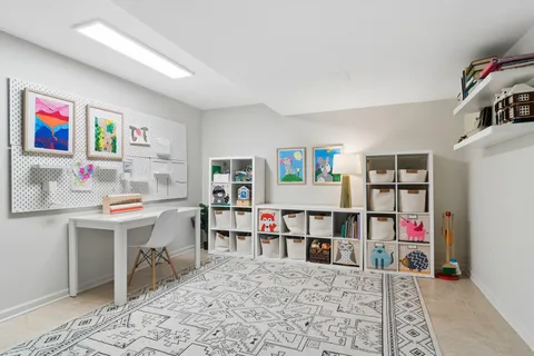 a living room with a couch and a table in it