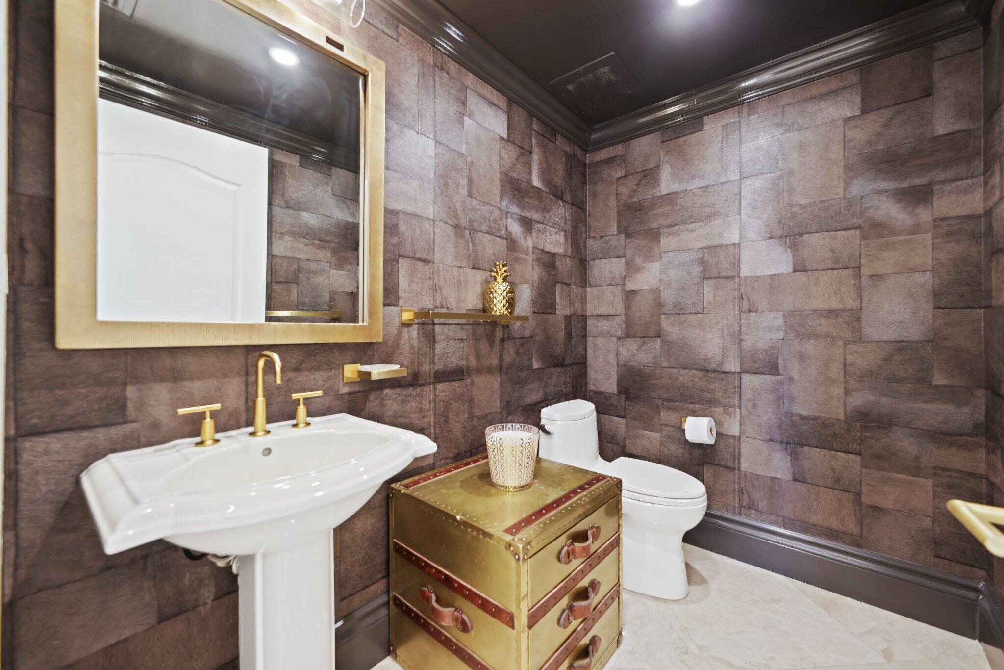 200 East Palmetto Park Road, Unit 811 Boca Raton, FL 33432 - Photo 17 of 44 a bathroom with a sink a toilet and shower