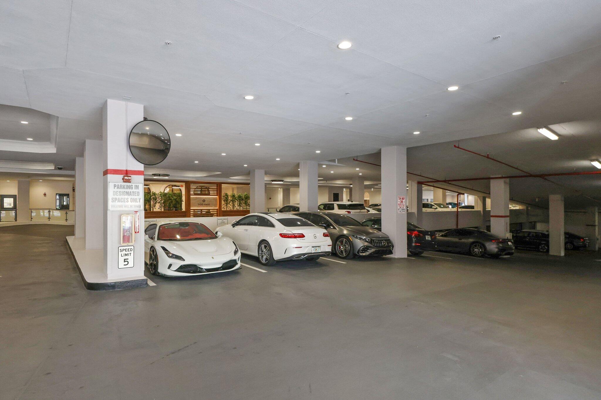 200 East Palmetto Park Road, Unit 811 Boca Raton, FL 33432 - Photo 39 of 44 a view of a cars park in front of house