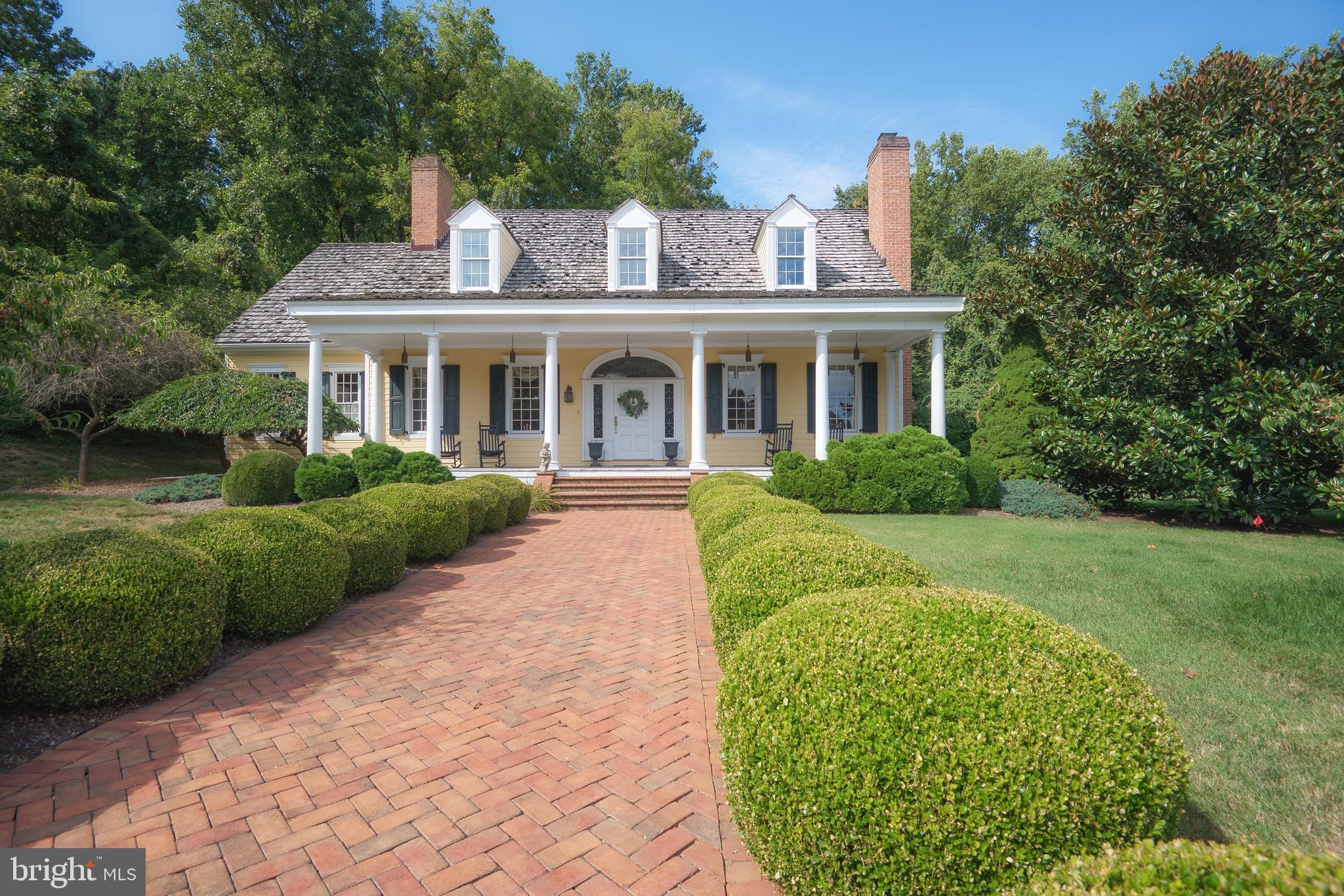 1400 Magers Landing Road Monkton, MD 21111 - Photo 2 of 46 Herringbone Brick walkway lined with Boxwoods