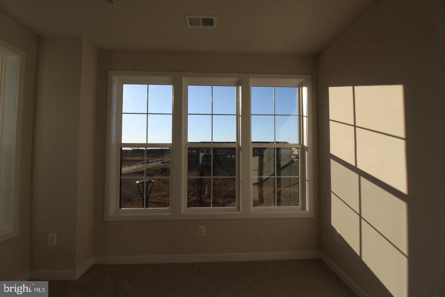 22383 Roanoke Rise Terrace Ashburn, VA 20148 - Photo 35 of 41 a view of empty room with windows