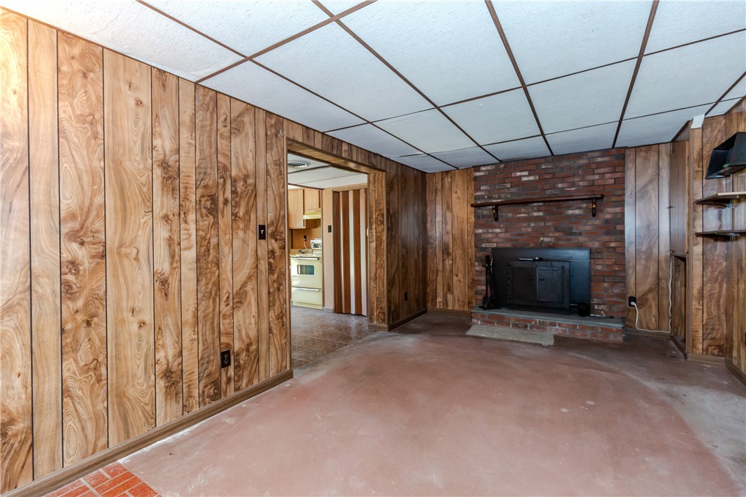 14 Meadow View Drive Smithfield, RI 02917 - Photo 28 of 39 Lower level family room with brick fireplace