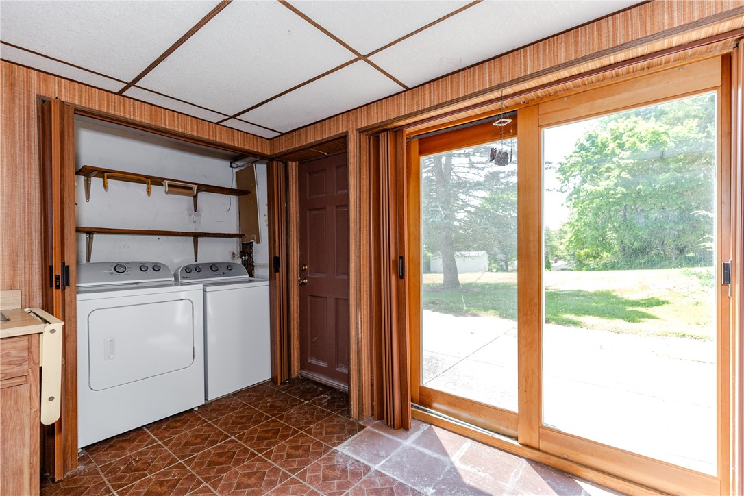 14 Meadow View Drive Smithfield, RI 02917 - Photo 31 of 39 Lower level laundry with sliding glass doors to back patio