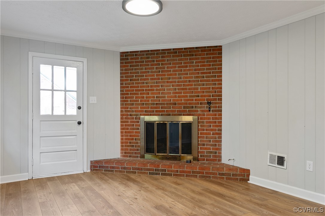 9761 Tuxford Road Chesterfield, VA 23236 - Photo 23 of 49 Unfurnished living room with light hardwood / wood