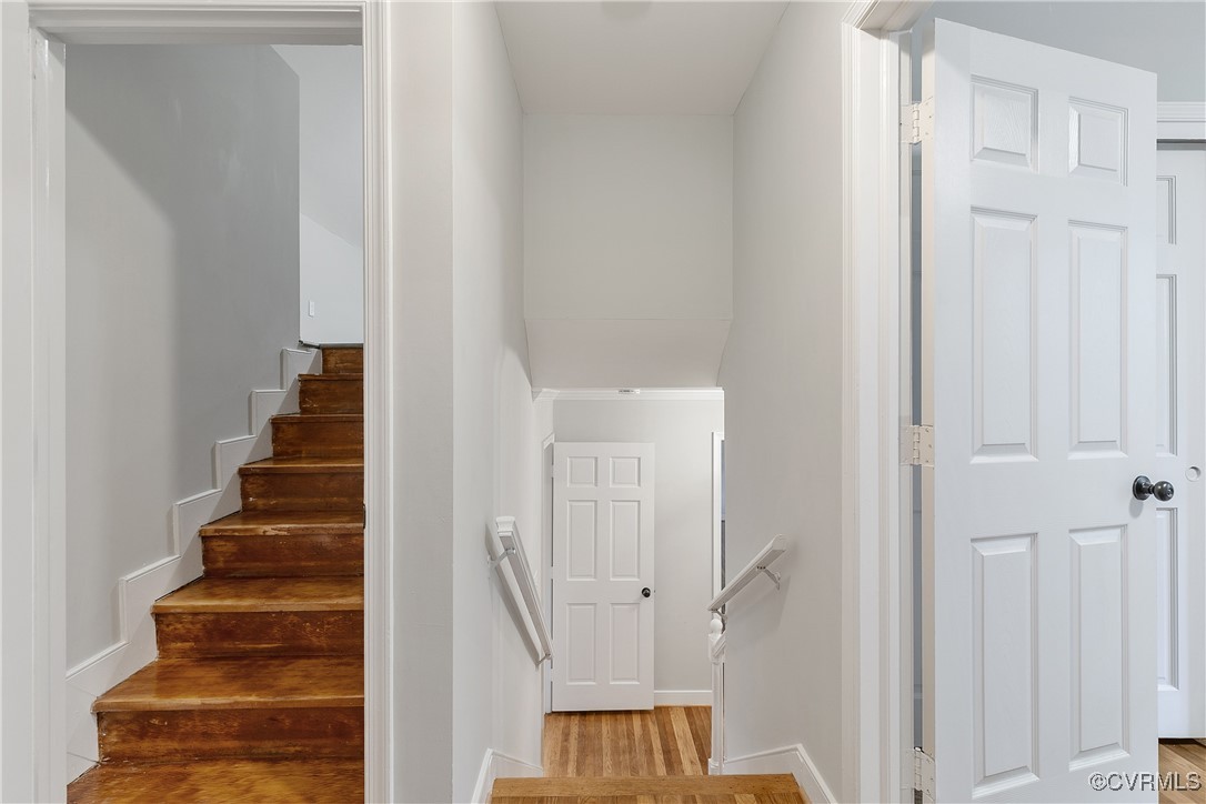 9761 Tuxford Road Chesterfield, VA 23236 - Photo 27 of 49 Stairway with hardwood / wood-style flooring