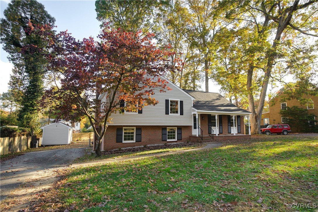 9761 Tuxford Road Chesterfield, VA 23236 - Photo 3 of 49 Tri-level home featuring a shed, a front yard, and
