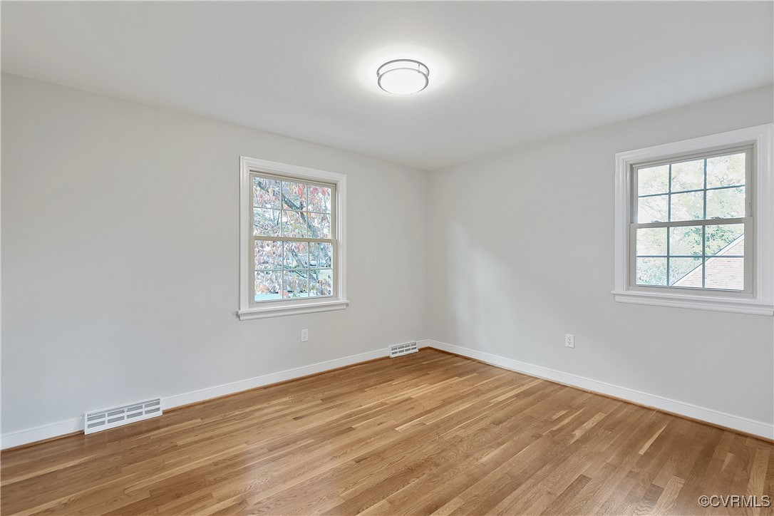 9761 Tuxford Road Chesterfield, VA 23236 - Photo 33 of 49 Spare room with light hardwood / wood-style floori