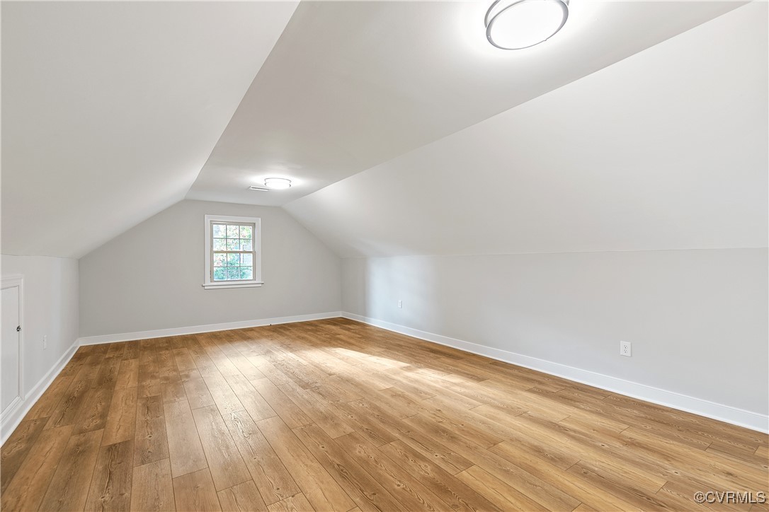9761 Tuxford Road Chesterfield, VA 23236 - Photo 38 of 49 Bonus room featuring hardwood / wood-style floorin