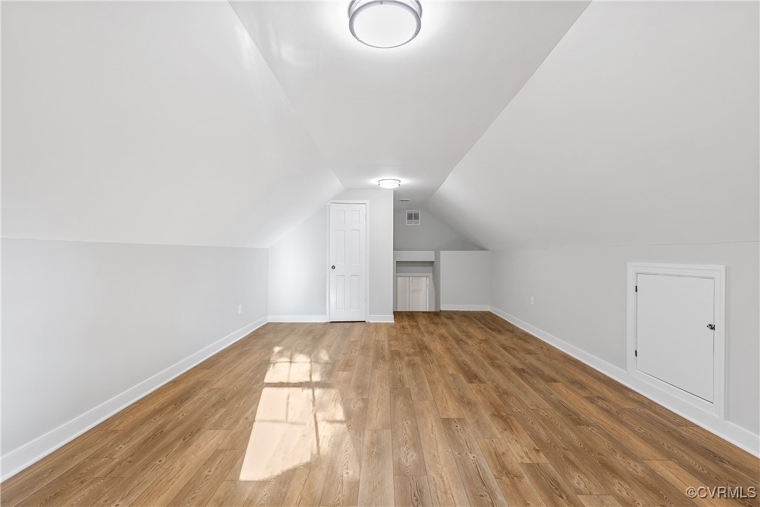 9761 Tuxford Road Chesterfield, VA 23236 - Photo 39 of 49 Bonus room with lofted ceiling and hardwood / wood