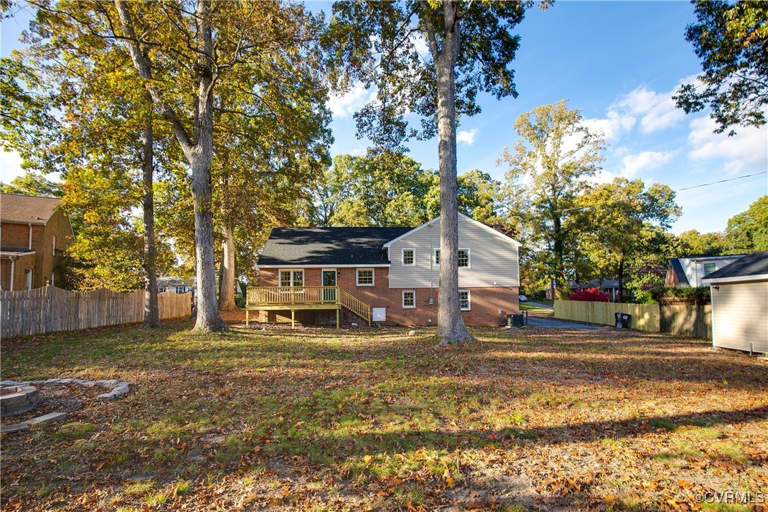 9761 Tuxford Road Chesterfield, VA 23236 - Photo 44 of 49 View of yard with a wooden deck