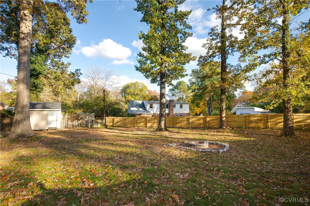 9761 Tuxford Road Chesterfield, VA 23236 - Photo 47 of 49 View of yard featuring a storage shed
